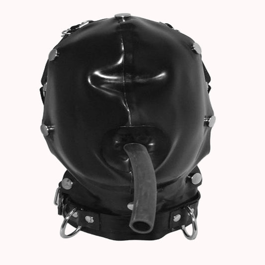 A glossy black latex hooded mask with a protruding gag tube, decorated with silver metal studs and rings, shown against a plain off-white background.