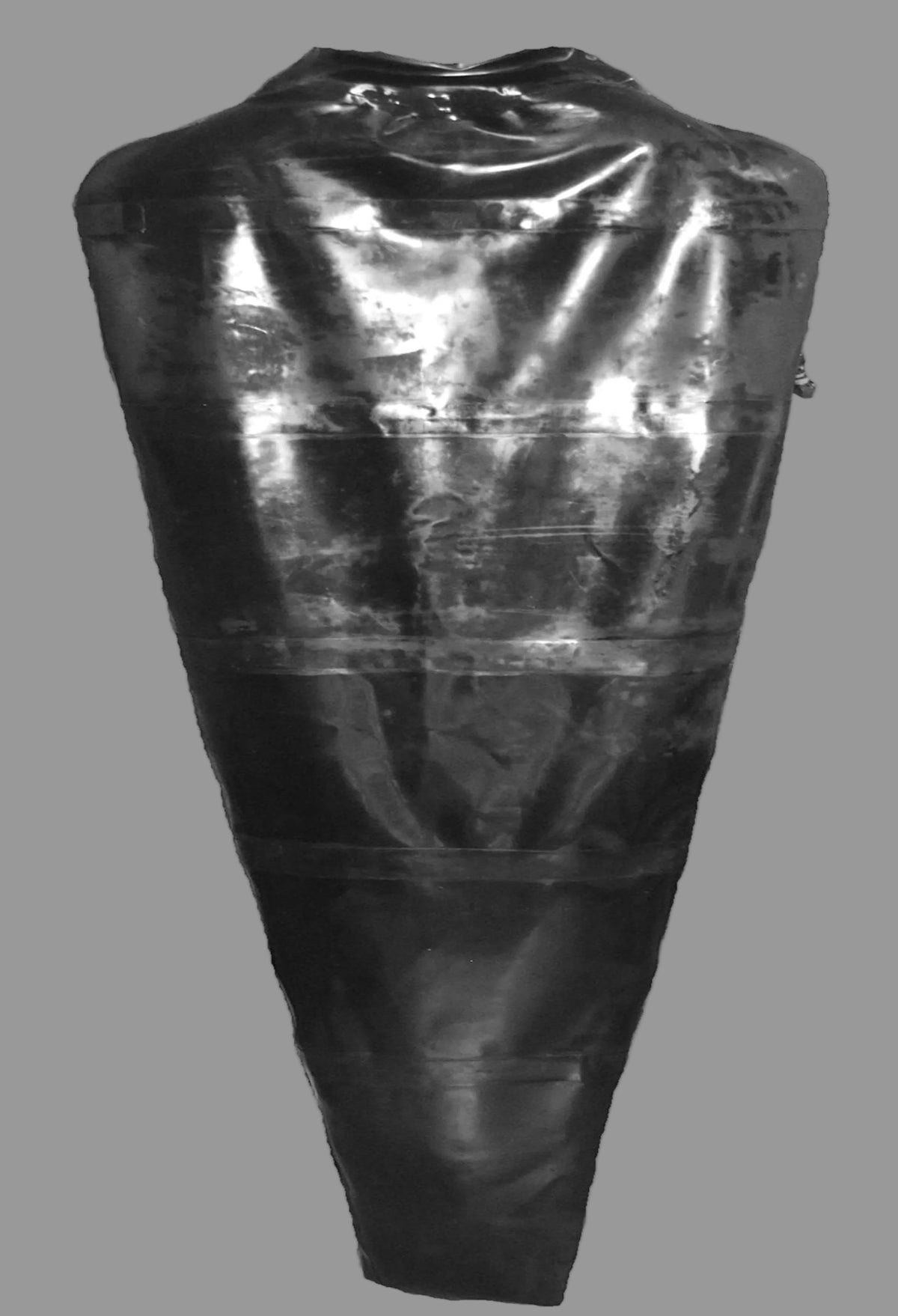 A black shiny inflatable latex  body bag  with neck seal
