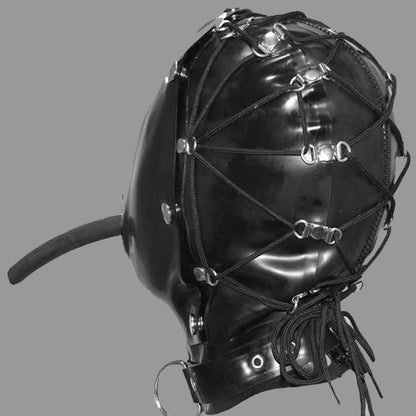 A glossy black latex hood with an attached black muzzle tube, decorated with black laces and silver metal rings and buckles, shown against a plain off-white background.