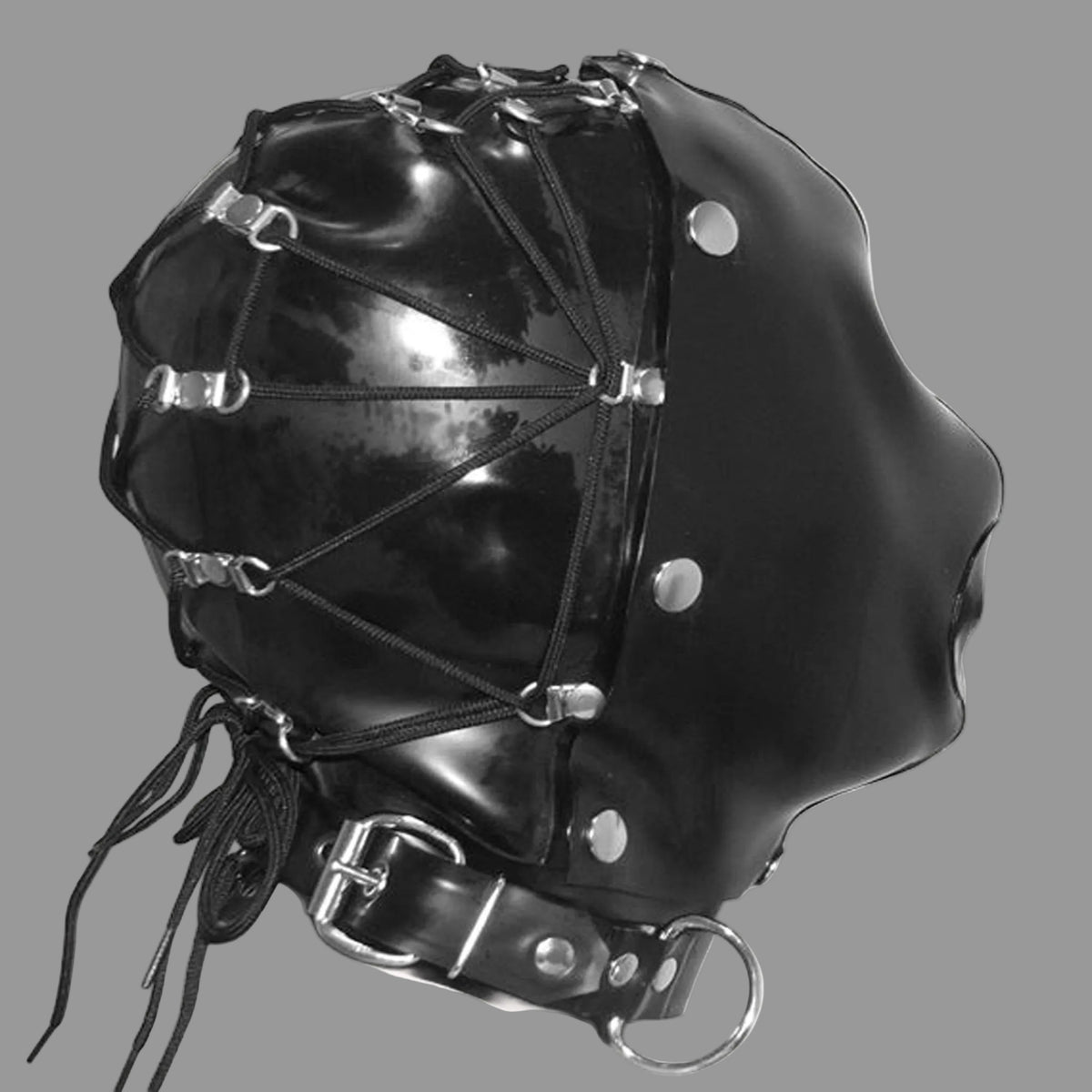A glossy black latex hood with an attached black leather collar, featuring silver metal rivets, buckles, and D-rings, shown against a plain off-white background.